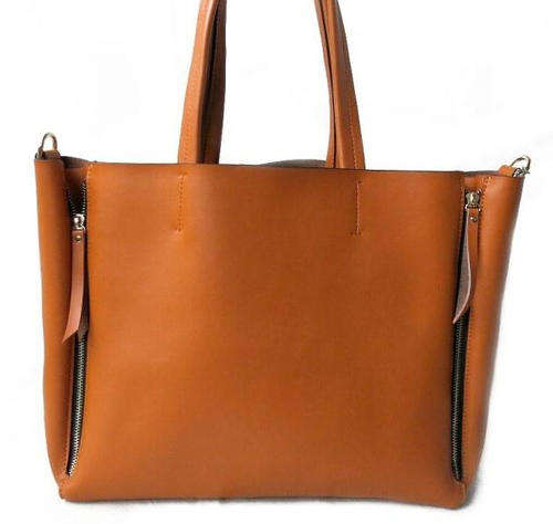 Genuine leather large capacity stars love bag. Brown color. Stock in ZA