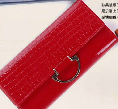 Enamelled leather crocodile pattern ladies purse. Red color.