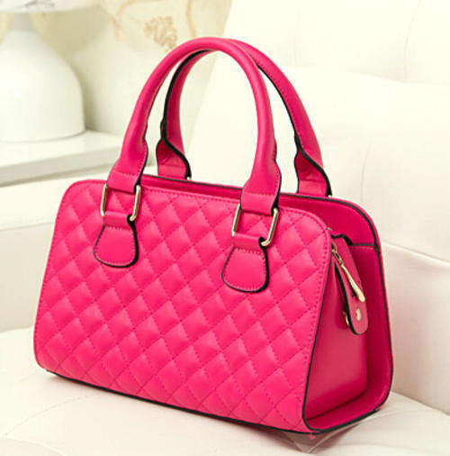 Elegant medium size useful work or leisure handbag. Rose color. Stock in ZA