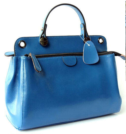 Genuine leather royal blue color very nice handbag with belt. Stock in ZA