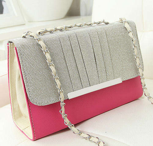 Shining retro ladies handbag with chains. Rose color. Stock in ZA