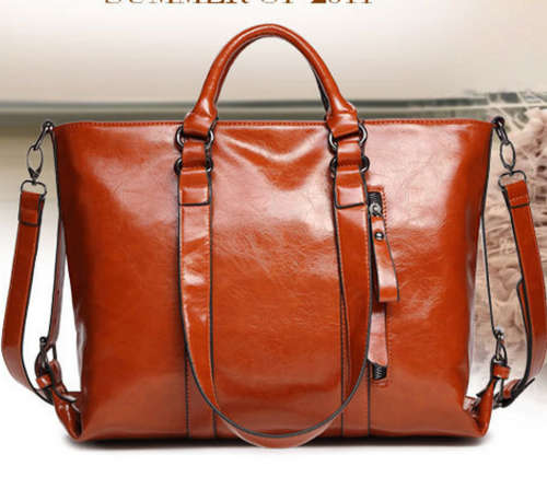 Waxy look motorcycle large capacity handbag. Brown color. In my own stock