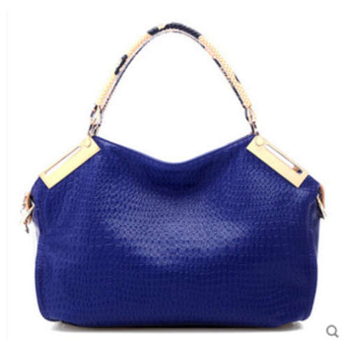 Retro snake pattern ladies handbag. with belt. diamond blue. Stock in ZA