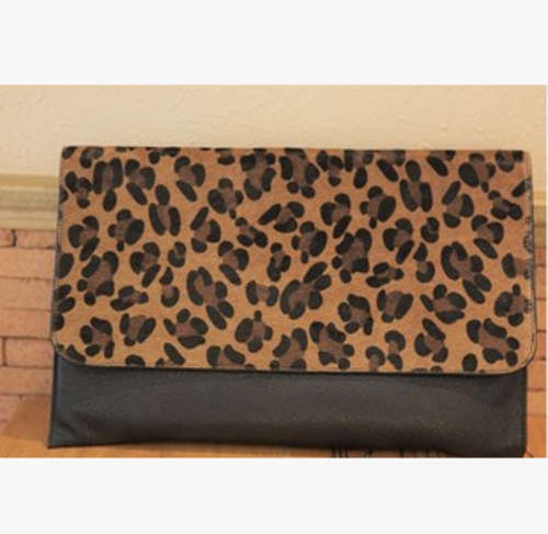 Leopard pattern ladies clutch. Stock in ZA