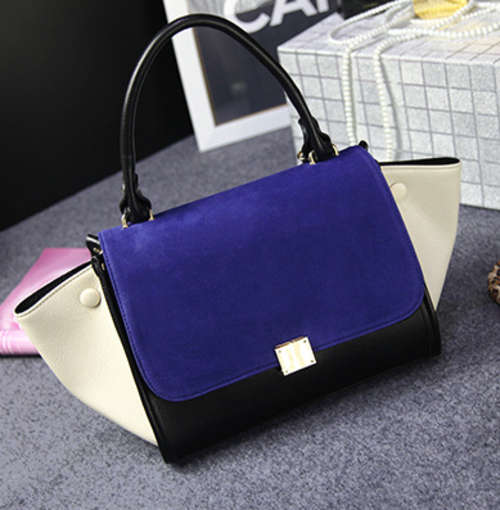 Classic design smily bat style ladies handbag with strape. Nubuck blue. Stock in ZA