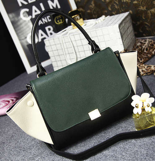 Classic design smily bat style ladies handbag with strape. Nubuck green. Stock in ZA