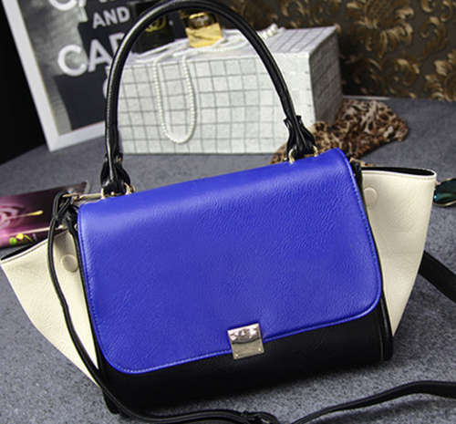 Classic design smily bat style ladies handbag with strape.