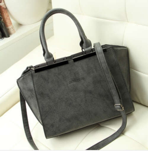 Nubuck stereotypia ladies handbag. Grey color. Stock in ZA