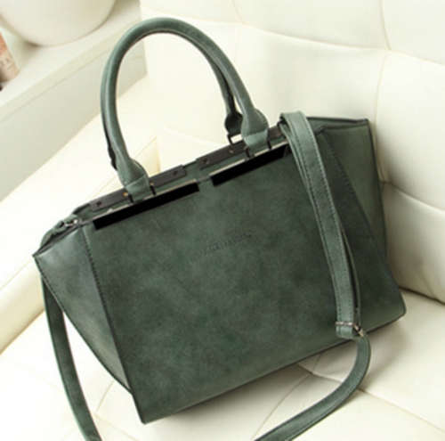 Nubuck stereotypia ladies handbag. Green color. Stock in ZA