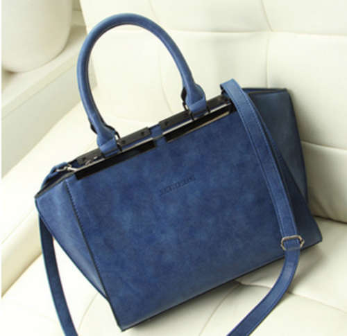 Nubuck stereotypia ladies handbag. Blue color. Stock in ZA
