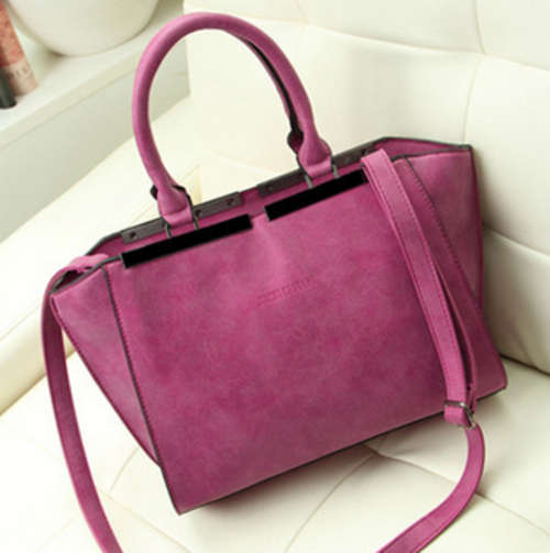 Nubuck stereotypia ladies handbag. purple rose color. Stock in ZA
