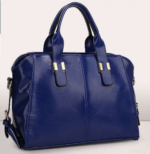 Noble style ladies large handbag with strape. Blue color. Stock in ZA