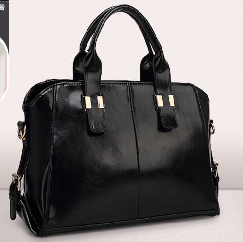Noble style ladies large handbag with strape. Black color. Stock in ZA