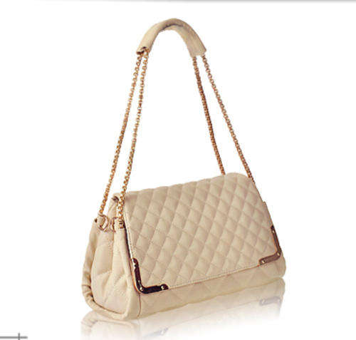 Elegant ladies chain handbag with strape. Rice white color. Stock in ZA