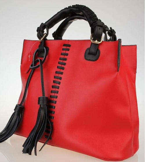 Large capacity classic genuine leather tassels handbag. Red color. Stock in ZA