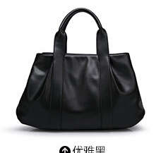 Simply design large capacity ladies handbag with stretch. Black color. Stock in ZA