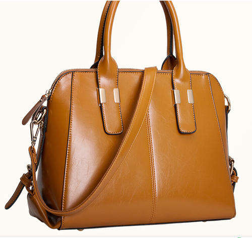 Noble style ladies large handbag with strape. Brown color. Stock in ZA