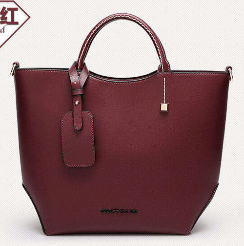 Classic and fashion elegant ladies handbag. maroon color. Stock in ZA
