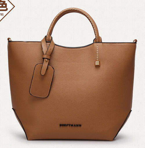 Classic and fashion elegant ladies handbag. Brown color. Stock in ZA