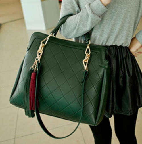 Very useful office ladies handbag with strap. Dark green color. Stock in ZA