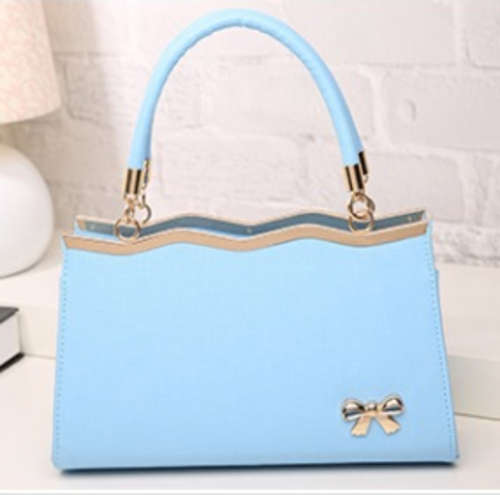 Beautiful and fashion bow ladies handbag, Blue color. Stock in ZA