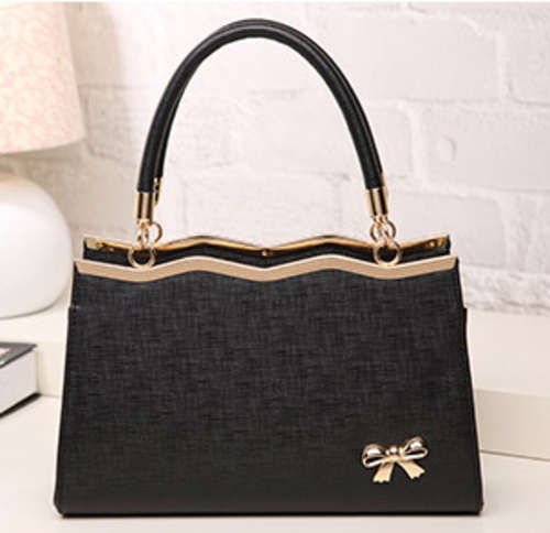 Beautiful and fashion bow ladies handbag, Black color. Stock in ZA