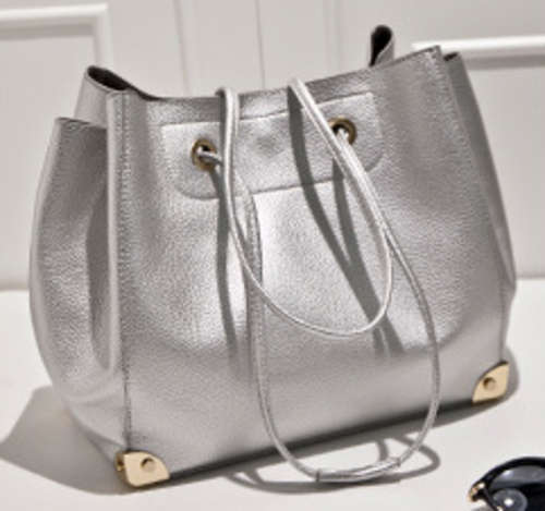 Amazing design ladies large handbag with strap and a inner nubuck bag. Silver color. Stock in ZA