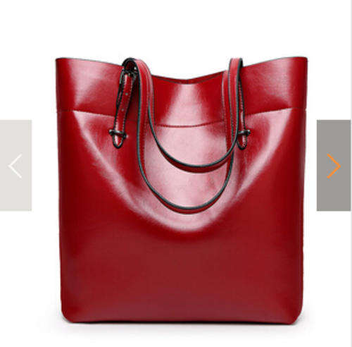 Smooth surface fashion large capacity ladies handbag with strape, maroon color. Stock in ZA