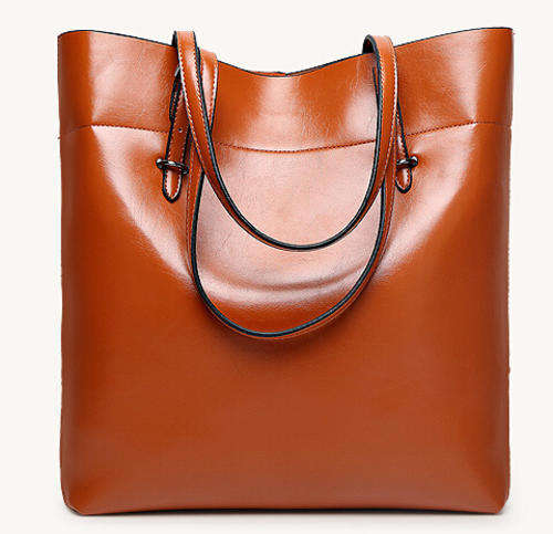Smooth surface fashion large capacity ladies handbag with strape, Brownb color. Stock in ZA