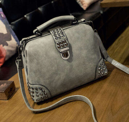 Nubuck retro rivets design bucket bag. Grey color. Stock in ZA