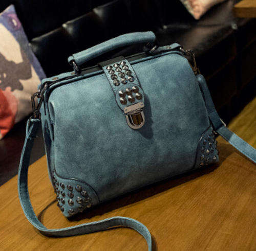 Nubuck retro rivets design bucket bag. Blue green color. Stock in ZA