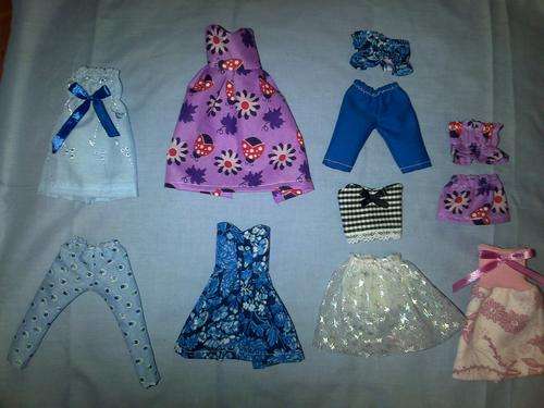 set of assorted hand made barbie clothes