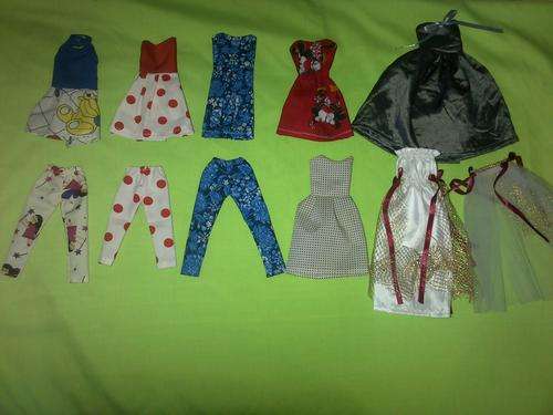 assorted hand made barbie doll clothes