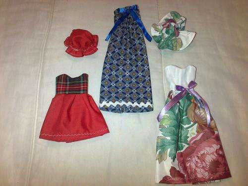 assorted hand made barbie doll clothes