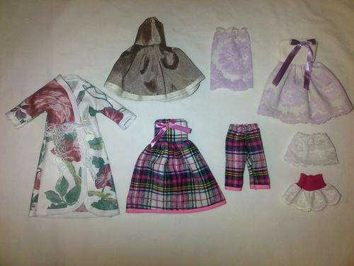 assorted hand made barbie doll clothes