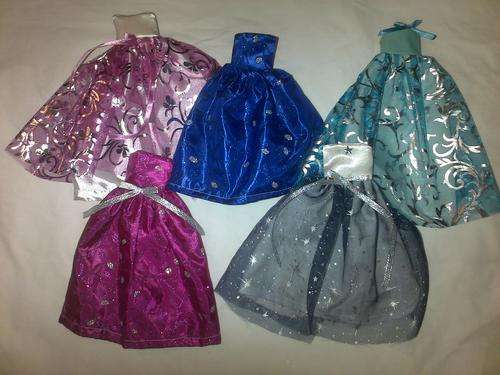 assorted hand made barbie doll clothes