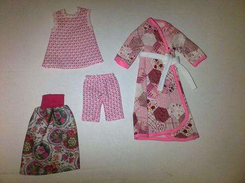 assorted hand made barbie doll clothes
