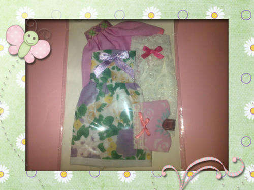 assorted hand made barbie doll clothes
