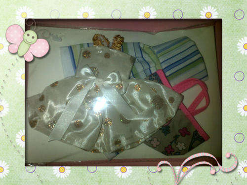 assorted hand made barbie doll clothes
