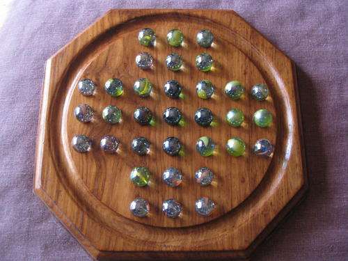 WOODEN SOLITAIRE GAME.