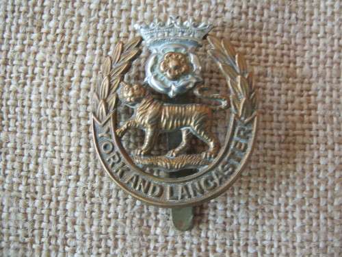 YOURK AND LANCASTER REGT. CAP BADGE