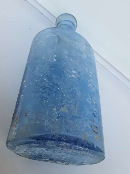 Antique light blue Woodward Chemist bottle