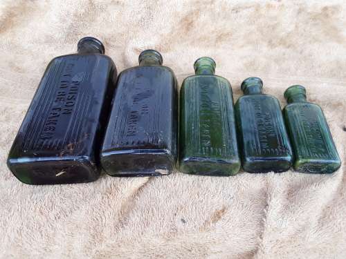 Five Poison Not To Be Taken green glass bottles 6,4,2,1 & 1/2 oz