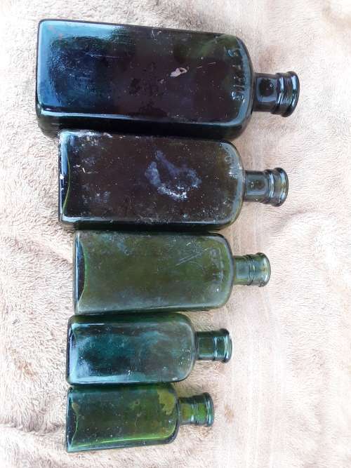 Five Poison Not To Be Taken green glass bottles 6,4,2,1 & 1/2 oz