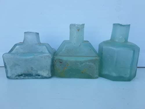 Three ink bottles