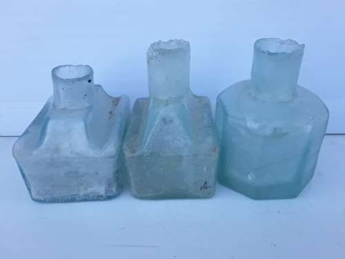 Three ink bottles