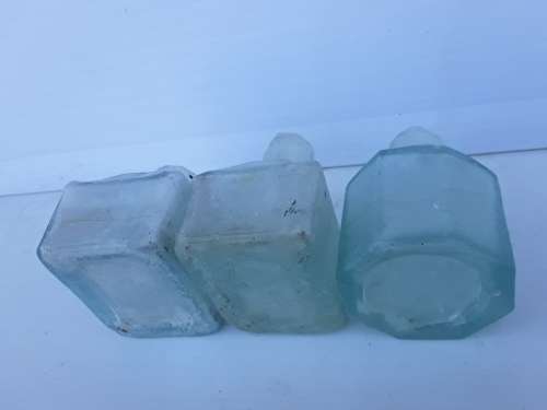 Three ink bottles