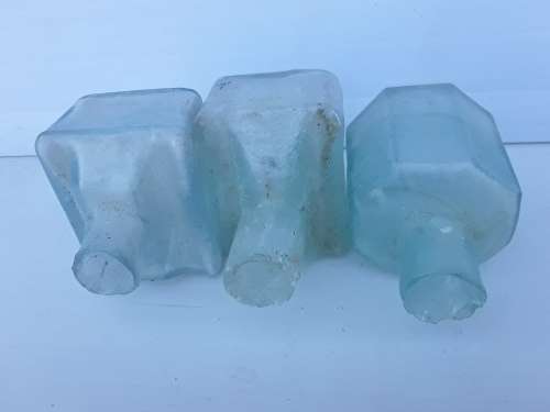 Three ink bottles