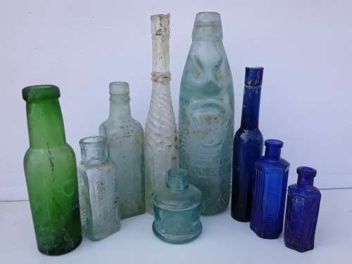 Crystal Springs Codd bottle and other antique bottles