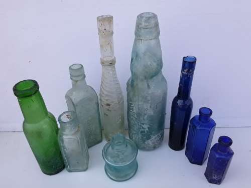 Crystal Springs Codd bottle and other antique bottles